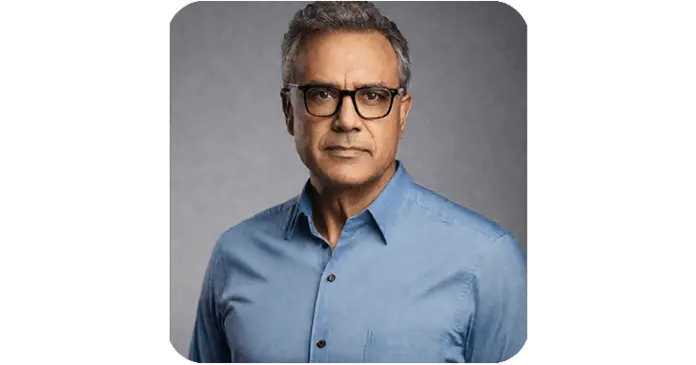 "Testimonial from a man wearing a blue button-up shirt, sharing his experience with Slimya. The background is neutral gray, keeping the focus on his story."